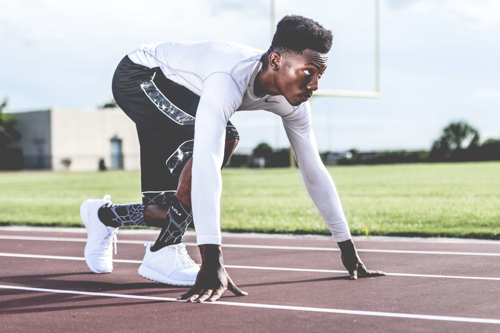 A black male sprinter on the race track